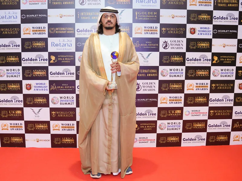 CEO receiving World CEO Award on stage